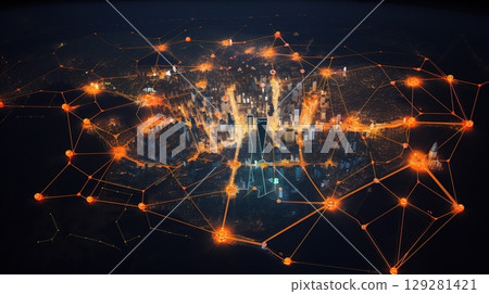 City skyline illuminated at night with an intricate network of lights and connections visible from above in a bustling urban area 129281421