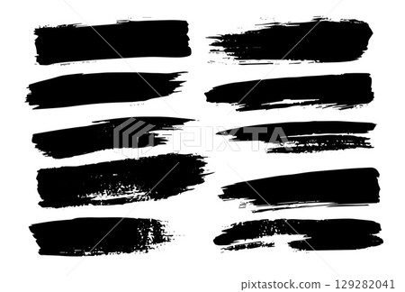 Set of black grunge brush strokes and ink splashes with rough texture isolated on white background perfect for abstract design banners and artistic overlays. Set of black grunge brush strokes and ink splashes with rough texture isolated on white background perfect for abstract design banners and artistic overlays. 129282041