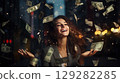A beautiful laughing woman catches flying money, depicted in this lively and dynamic scene 129282285