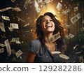 Woman laughing and throwing money 129282286