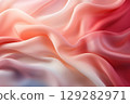 abstract gradient background, silk fabric texture, pink and beige 129282971