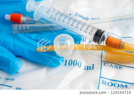 Foley catheter and urine drainage bag collect urine for disability or patient in hospital. Foley catheter and urine drainage bag collect urine for disability or patient in hospital. 129284714