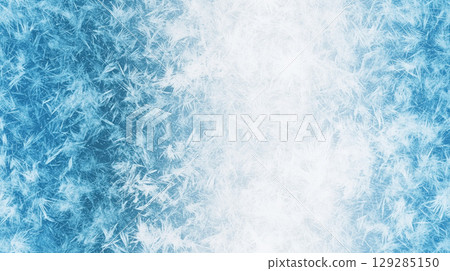 Detailed close up of frost patterns on a blue gradient background showcasing intricate ice crystals 129285150