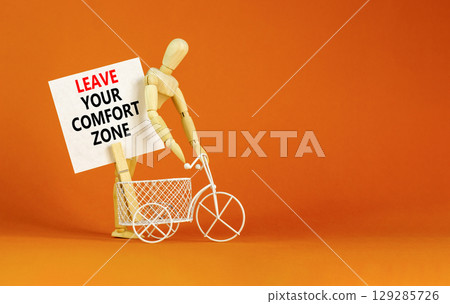 Leave your comfort zone symbol. Concept words Leave your comfort zone on beautiful white paper. Beautiful orange paper background. Business psychological Leave your comfort zone concept. Copy space. Leave your comfort zone symbol. Concept words Leave your comfort zone on beautiful white paper. Beautiful orange paper background. Business psychological Leave your comfort zone concept. Copy space. 129285726