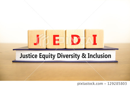 Justice equity diversity inclusion symbol. Concept words JEDI Justice Equity Diversity Inclusion on blocks. Beautiful white background. Business justice equity diversity inclusion concept. Copy space Justice equity diversity inclusion symbol. Concept words JEDI Justice Equity Diversity Inclusion on blocks. Beautiful white background. Business justice equity diversity inclusion concept. Copy space 129285803
