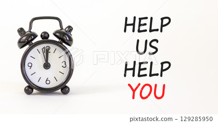 Help you symbol. Concept words phrase Help us help you on beautiful white paper. Black alarm clock. Beautiful white paper background. Business Help you concept. Copy space. Help you symbol. Concept words phrase Help us help you on beautiful white paper. Black alarm clock. Beautiful white paper background. Business Help you concept. Copy space. 129285950