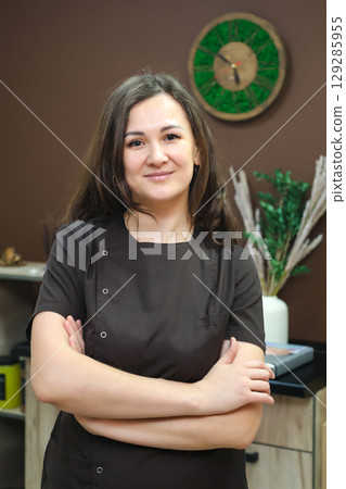 Portrait of a Professional Massage Salon Owner in Work Attire, Radiating Confidence and Calmness 129285955