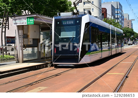 A train stopped on the Fukui Railway Fukubu Line in Daimyocho, Fukui Castle Ruins A train stopped on the Fukui Railway Fukubu Line in Daimyocho, Fukui Castle Ruins 129286653