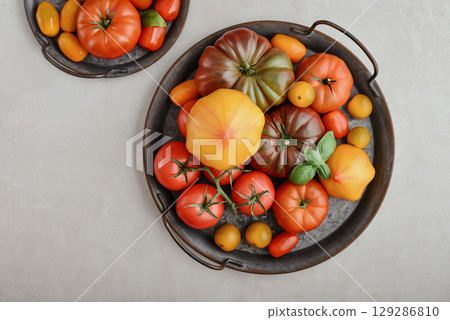 Assortment of ripe tomatoes varieties. Assortment of ripe tomatoes varieties. 129286810