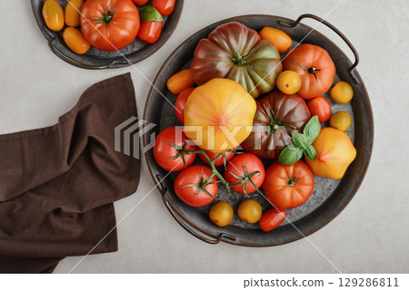 Assortment of ripe tomatoes varieties. Assortment of ripe tomatoes varieties. 129286811