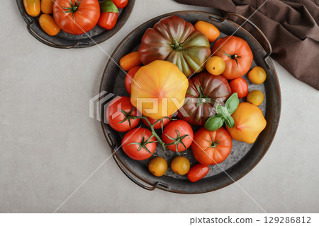 Assortment of ripe tomatoes varieties. Assortment of ripe tomatoes varieties. 129286812