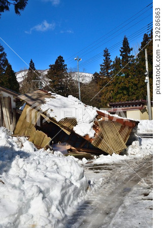Houses destroyed by snow 129286863