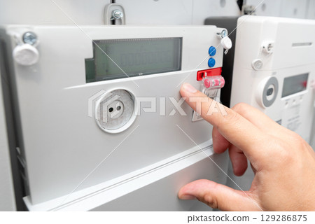 Electric energy meter measuring power usage Electric energy meter measuring power usage 129286875