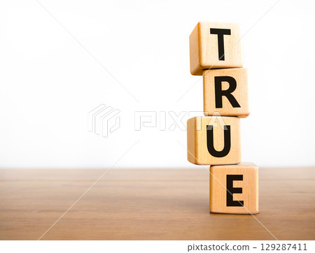 True symbol. Concept word True on beautiful wooden blocks. Beautiful wooden table white background. Business, lifestyle, support and true concept. Copy space. True symbol. Concept word True on beautiful wooden blocks. Beautiful wooden table white background. Business, lifestyle, support and true concept. Copy space. 129287411
