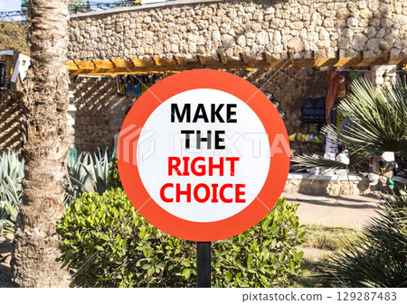 Make the right choice symbol. Concept words phrase Make the right choice on beautiful road sign. Beautiful palm tree background. Business Make the right choice concept. Copy space. Make the right choice symbol. Concept words phrase Make the right choice on beautiful road sign. Beautiful palm tree background. Business Make the right choice concept. Copy space. 129287483