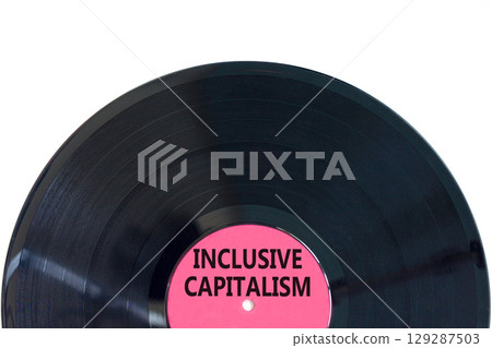 Inclusive capitalism symbol. Concept words Inclusive capitalism on beautiful black vinyl disk. Beautiful white table white background. Business inclusive capitalism concept. Copy space. 129287503