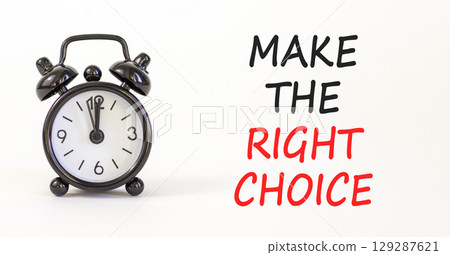 Make the right choice symbol. Concept words phrase Make the right choice on beautiful white paper. Black alarm clock. Beautiful white background. Business Make the right choice concept. Copy space. Make the right choice symbol. Concept words phrase Make the right choice on beautiful white paper. Black alarm clock. Beautiful white background. Business Make the right choice concept. Copy space. 129287621