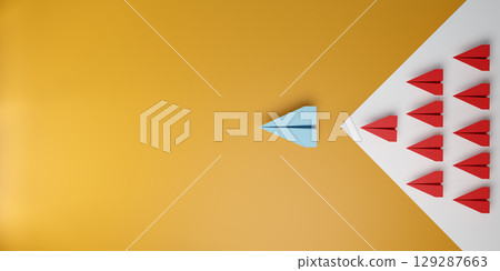 3D illustration of a blue paper plane leading a group of red planes in arrow shape on orange background. Symbol of leadership, innovation, success, and standing out. 129287663
