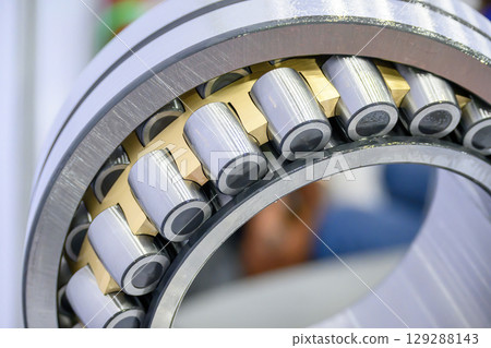 Close up scene assembly of the cylindrical rolling bearing parts. Close up scene assembly of the cylindrical rolling bearing parts. 129288143