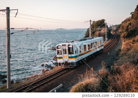 Hisatsu Orange Railway running through the countryside in the evening Hisatsu Orange Railway running through the countryside in the evening 129289110