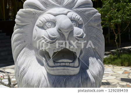 Fragment of the sculpture of lion in the Buddhist Hua Da Bao Monastery 129289439