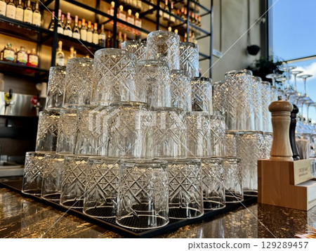 clean glasses on the bar counter. High quality photo clean glasses on the bar counter. High quality photo 129289457
