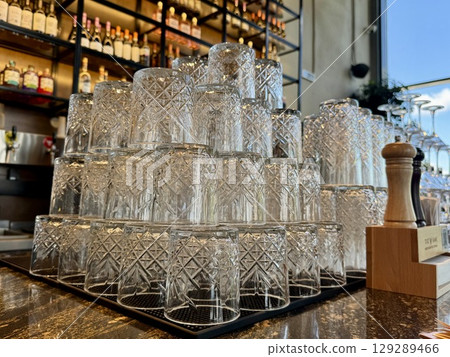 clean glasses on the bar counter. High quality photo clean glasses on the bar counter. High quality photo 129289466