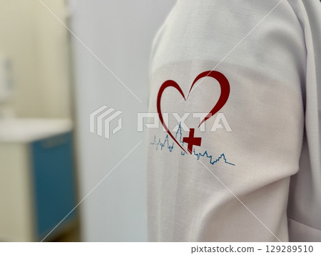 a medical officer in a white coat with a logo in Moscow. High quality photo 129289510