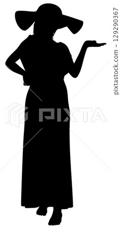 Girl in long dress and wide brimmed hat silhouette 129290367