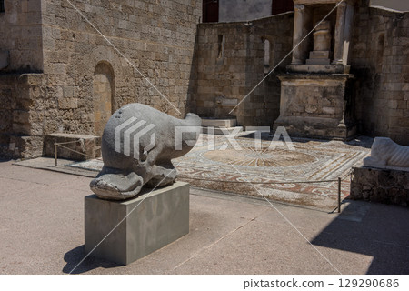 Greek sculpture dolphin. Greek elements of architectural decorations of buildings, columns Greek sculpture dolphin. Greek elements of architectural decorations of buildings, columns 129290686