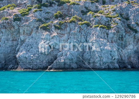 Sea and beach in Anthony Quinn bay, Rhodes island, Dodecanese, Greece Sea and beach in Anthony Quinn bay, Rhodes island, Dodecanese, Greece 129290786