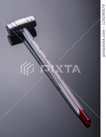 Thermometer for wine on a black background Thermometer for wine on a black background 129290879