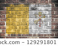 Vatican City flag on a brick wall background 129291801