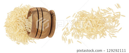 rice basmati in a wooden bowl isolated on white background. Top view. Flat lay rice basmati in a wooden bowl isolated on white background. Top view. Flat lay 129292111