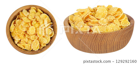 Cornflakes in wooden bowl isolated on white background. Top view. Flat lay 129292160