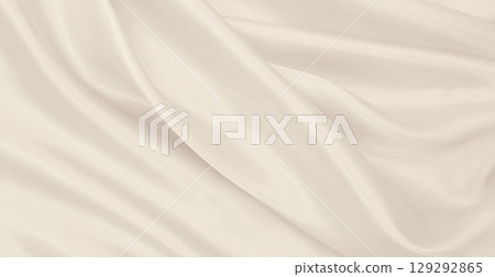 Smooth elegant golden silk or satin luxury cloth texture as wedding background. Luxurious background design. In Sepia toned. Retro style 129292865