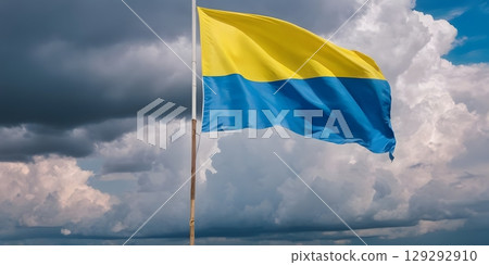 Ukrainian Flag Waving with Dramatic Sky. ?se in patriotic, cultural, postcards or backgrounds. 129292910