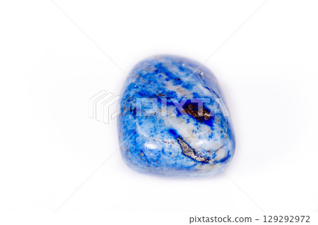Macro mineral stone blue lapis lazuli (afghanistan) on white background Macro mineral stone blue lapis lazuli (afghanistan) on white background 129292972