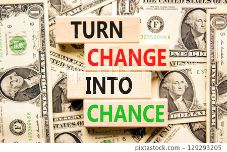 Turn change into chance symbol. Concept words phrase Turn change into chance on beautiful blocks. Dollar bills. Beautiful dollar bills background. Business Turn change into chance concept. Copy space. Turn change into chance symbol. Concept words phrase Turn change into chance on beautiful blocks. Dollar bills. Beautiful dollar bills background. Business Turn change into chance concept. Copy space. 129293205