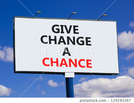 Give change a chance symbol. Concept words phrase Give change a chance on beautiful big white billboard. Beautiful blue sky cloud background. Business Give change a chance concept. Copy space. 129293267