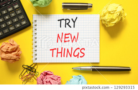 Try new things symbol. Concept words Try new things on beautiful white note. Black pen. Calculator. Beautiful yellow background. Business motivational lifestyle try new things concept. Copy space. Try new things symbol. Concept words Try new things on beautiful white note. Black pen. Calculator. Beautiful yellow background. Business motivational lifestyle try new things concept. Copy space. 129293315