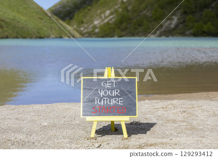 Get your future started symbol. Concept words Get your future started on beautiful black blackboard. Beautiful mountain lake background. Business get your future started concept. Copy space. Get your future started symbol. Concept words Get your future started on beautiful black blackboard. Beautiful mountain lake background. Business get your future started concept. Copy space. 129293412