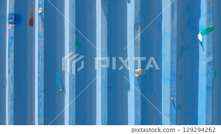 Abstract View of Blue Metal Wall Background Abstract View of Blue Metal Wall Background 129294262