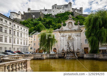 Historic old town of Salzburg and Hohensalzburg Fortress atop the Festungsberg hill in Salzburg, Austria Historic old town of Salzburg and Hohensalzburg Fortress atop the Festungsberg hill in Salzburg, Austria 129294293