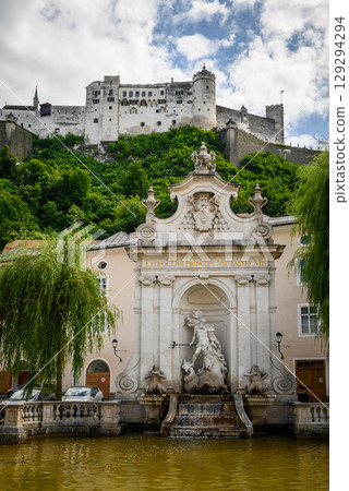 Historic old town of Salzburg and Hohensalzburg Fortress atop the Festungsberg hill in Salzburg, Austria Historic old town of Salzburg and Hohensalzburg Fortress atop the Festungsberg hill in Salzburg, Austria 129294294