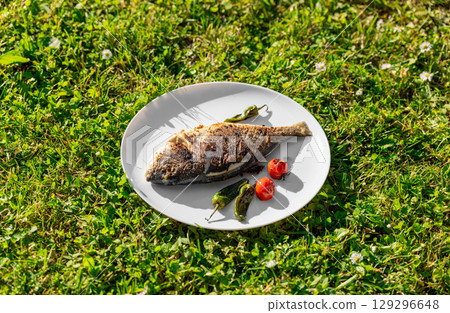 freshly grilled dorada freshly grilled dorada 129296648