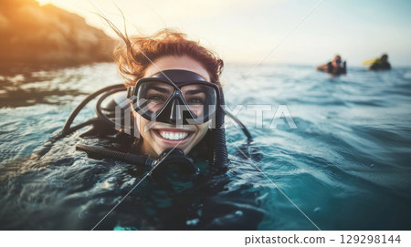 woman snorkeling sunset scene ocean sun 129298144