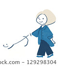 A woman walking a dog 129298304