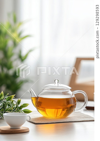 glass teapot tea table coaster closeup 129298593