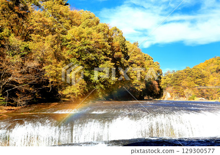 Autumn sweeping waterfall Autumn sweeping waterfall 129300577